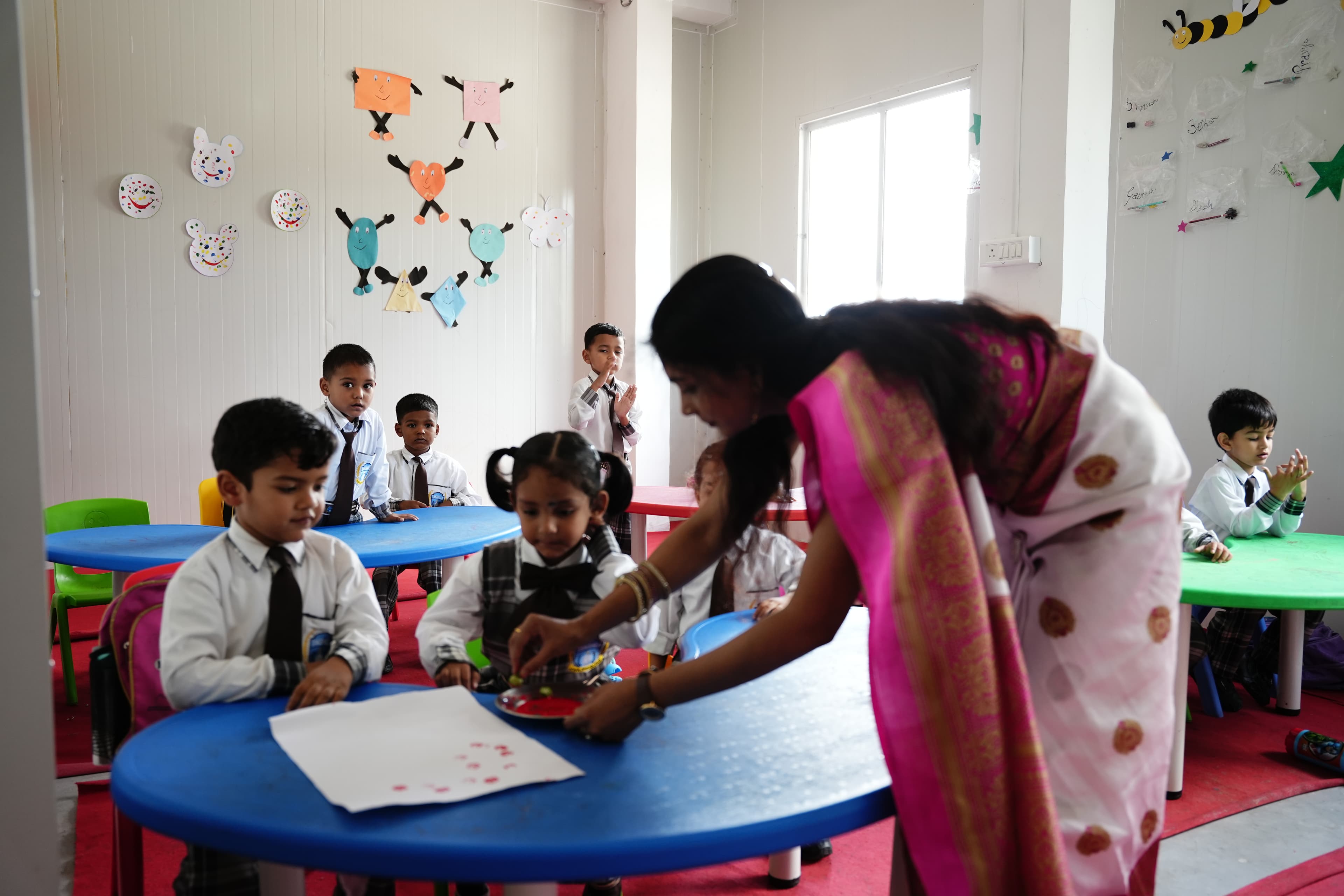Teacher Guiding Students